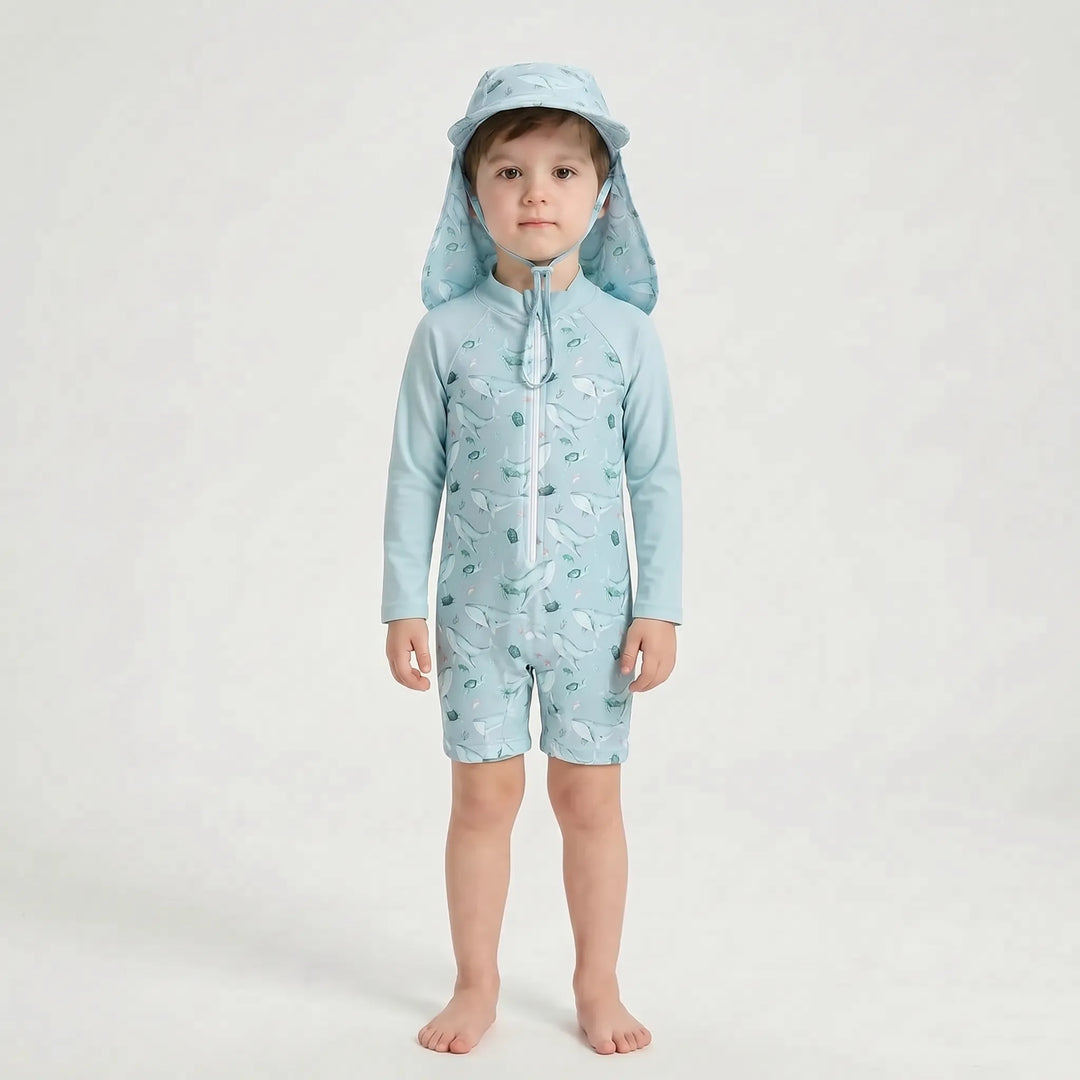 Stylish long-sleeve toddler rash guard swimsuit and coordinated sun hat, great for beach & pool kids' beachwear.