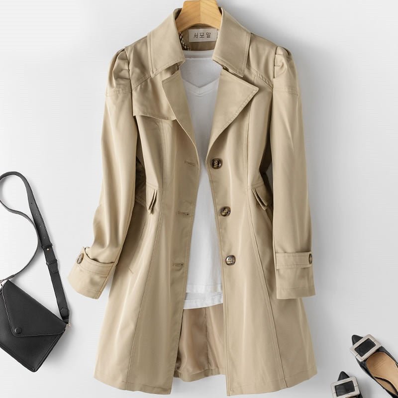 Trench da donna elegante in cashmere, beige, resistente all'acqua, con silhouette classica e bottoni, ideale per ogni occasio