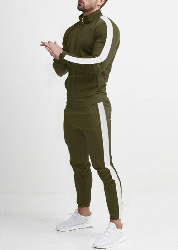"Tuta da uomo in pile grigio, elasticizzata, con dettagli rinforzati, per stile casual e comfort in ogni stagione."