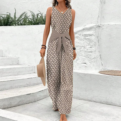"Tuta elegante donna senza maniche in cotone premium, colore neutro, silhouette sagomata, ideale per eventi estivi"