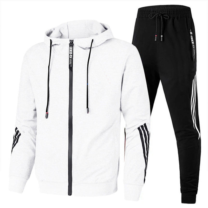 "Tuta sportiva uomo in misto lana grigia, design elegante con elastico in vita e polsini, adatta per allenamento e tempo libe