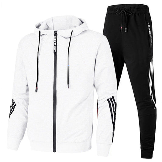 "Tuta sportiva uomo in misto lana grigia, design elegante con elastico in vita e polsini, adatta per allenamento e tempo libe