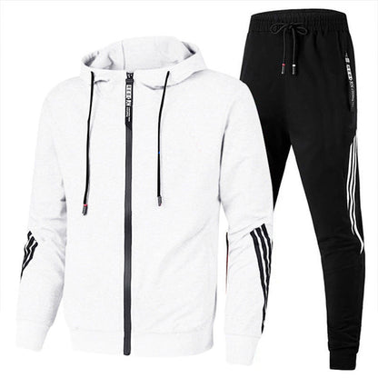 "Tuta sportiva uomo in misto lana grigia, design elegante con elastico in vita e polsini, adatta per allenamento e tempo libe