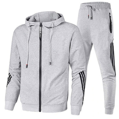 "Tuta sportiva uomo in misto lana grigia, design elegante con elastico in vita e polsini, adatta per allenamento e tempo libe
