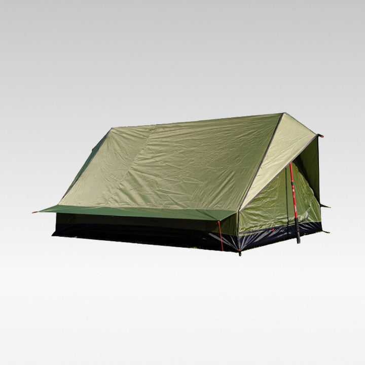 Ultralight A-frame trekking pole tent, solo setup, green in forest.