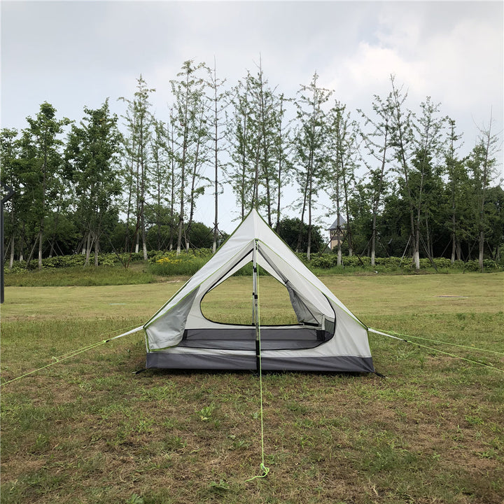 A-frame backpacking tent with rainfly deployed, ready for a storm.