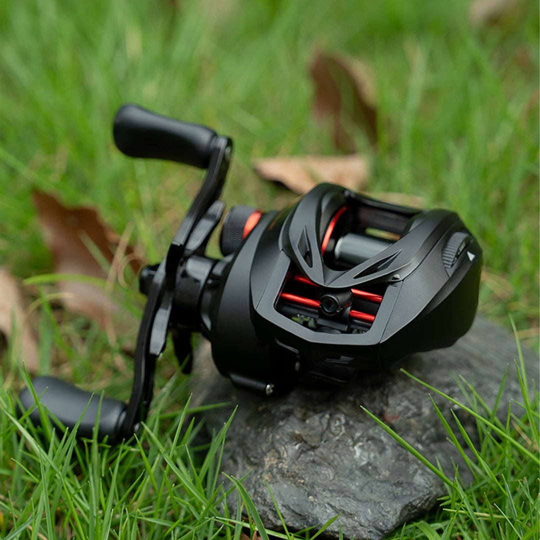 Side profile of a sleek ultralight baitcasting reel, showing the gear housing and spool tension knob, ready for fishing