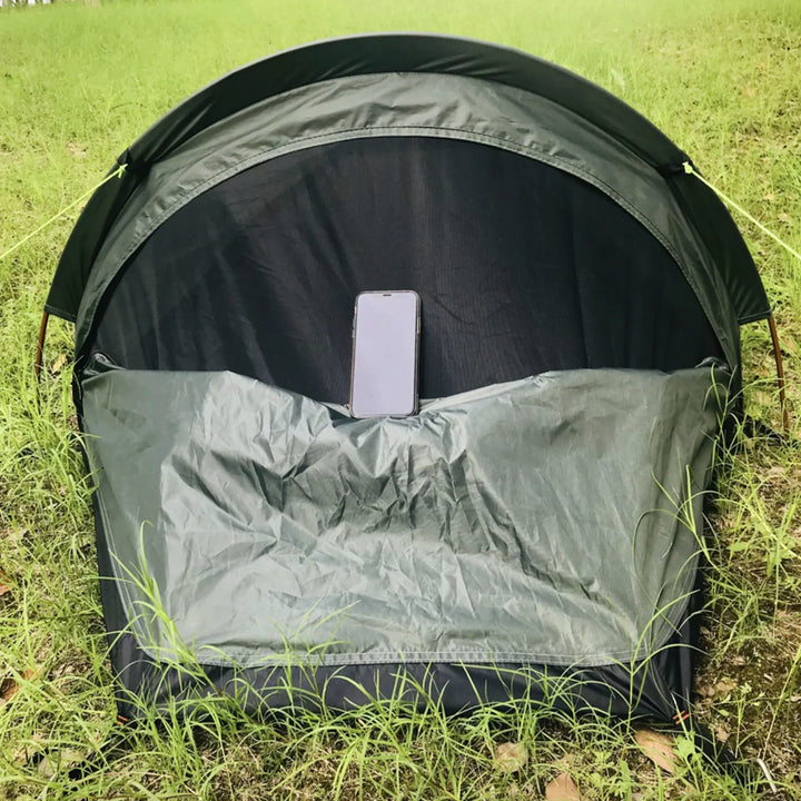 Bivy tent with rainfly deployed, emphasizing its waterproof and weather-resistant features.