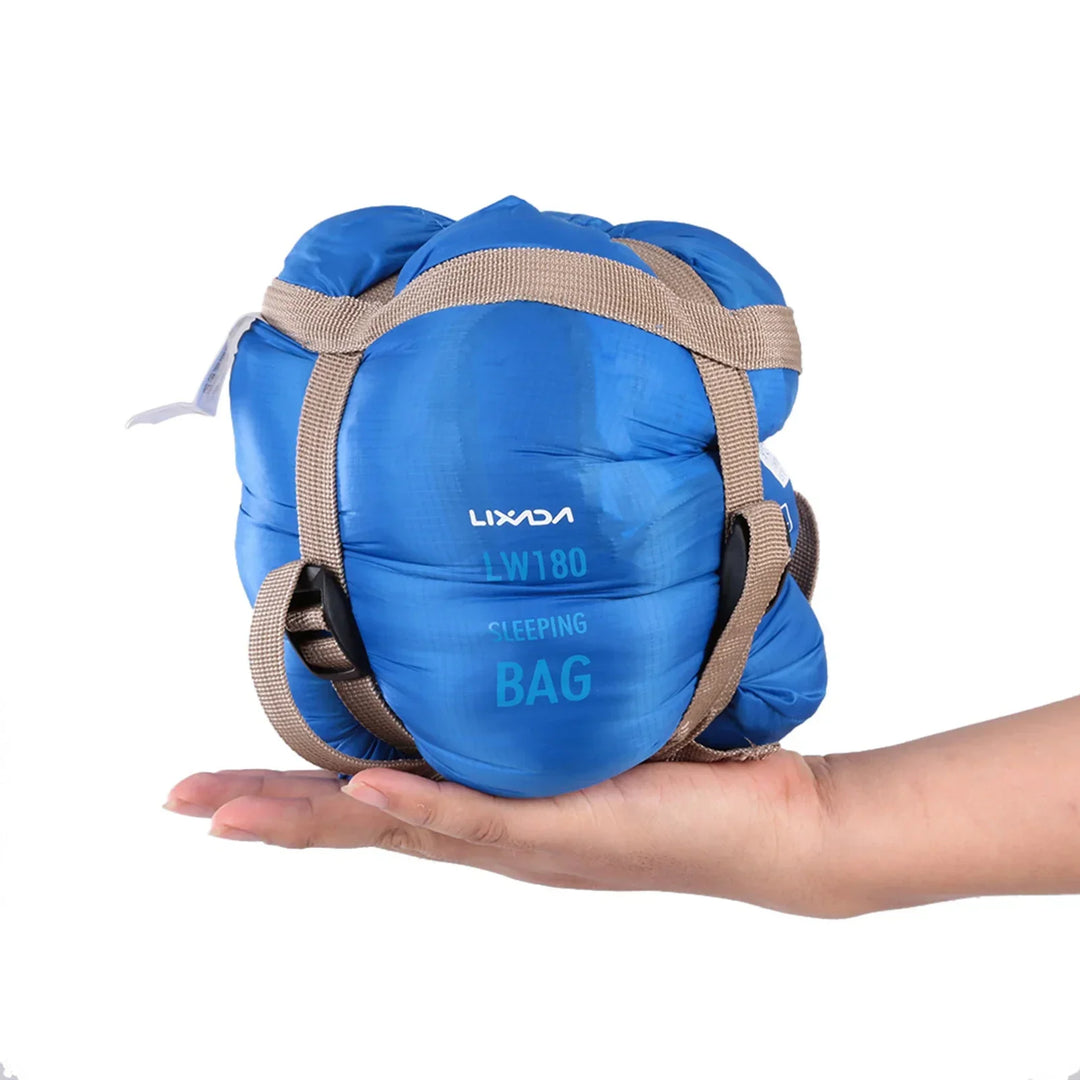Portable ultralight envelope sleeping bag for adults; compact design for camping, hiking, travel.