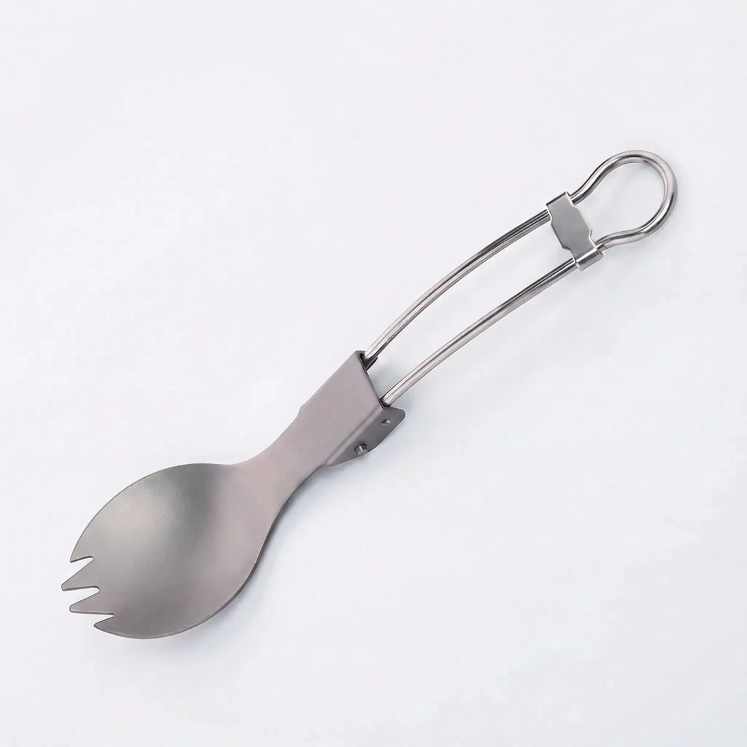 Compact titanium spork, perfect for backpacking and outdoor adventures. Foldable cutlery for meals.