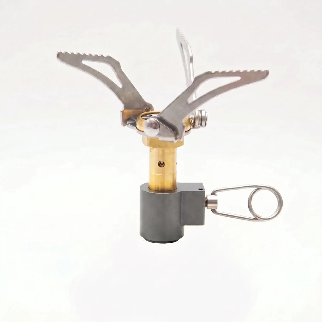 Efficient compact gas stove, ultralight and foldable for backpacking, camping, and fast outdoor cooking.