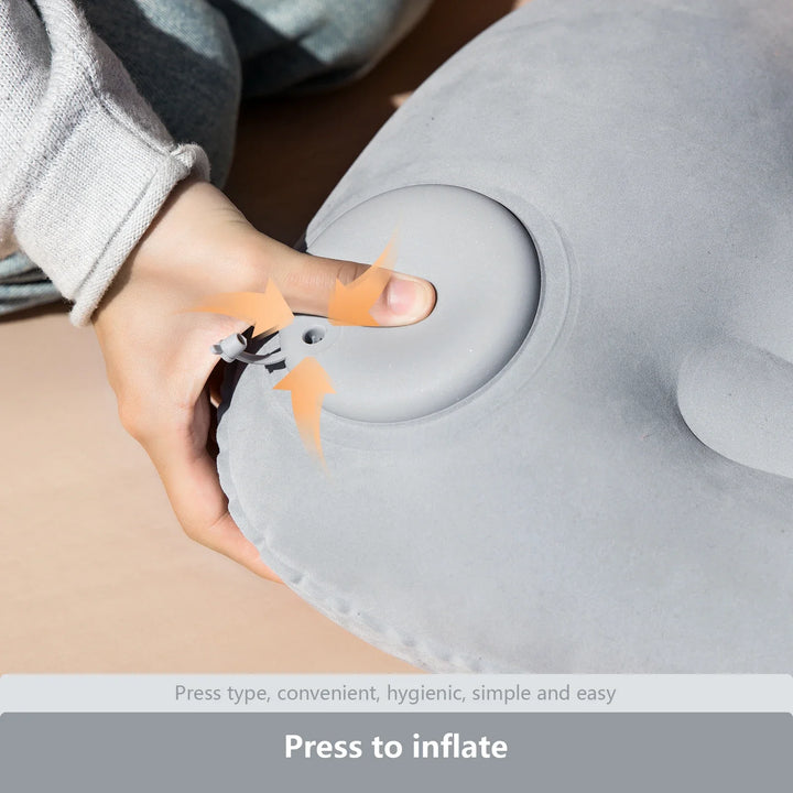 Packable ultralight camping pillow, inflatable with integrated pump, ideal for hiking and outdoor sleeping.