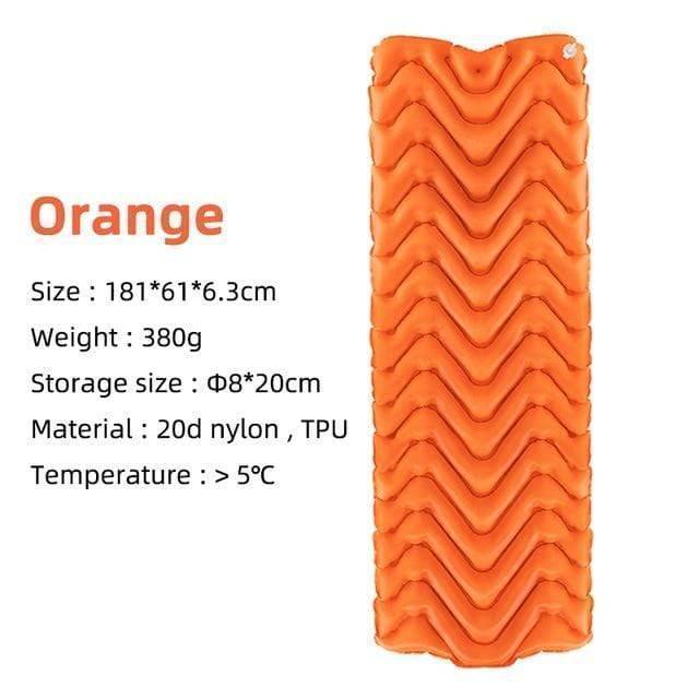 Durable camping mat in green, inflated and ready for a comfortable night in nature