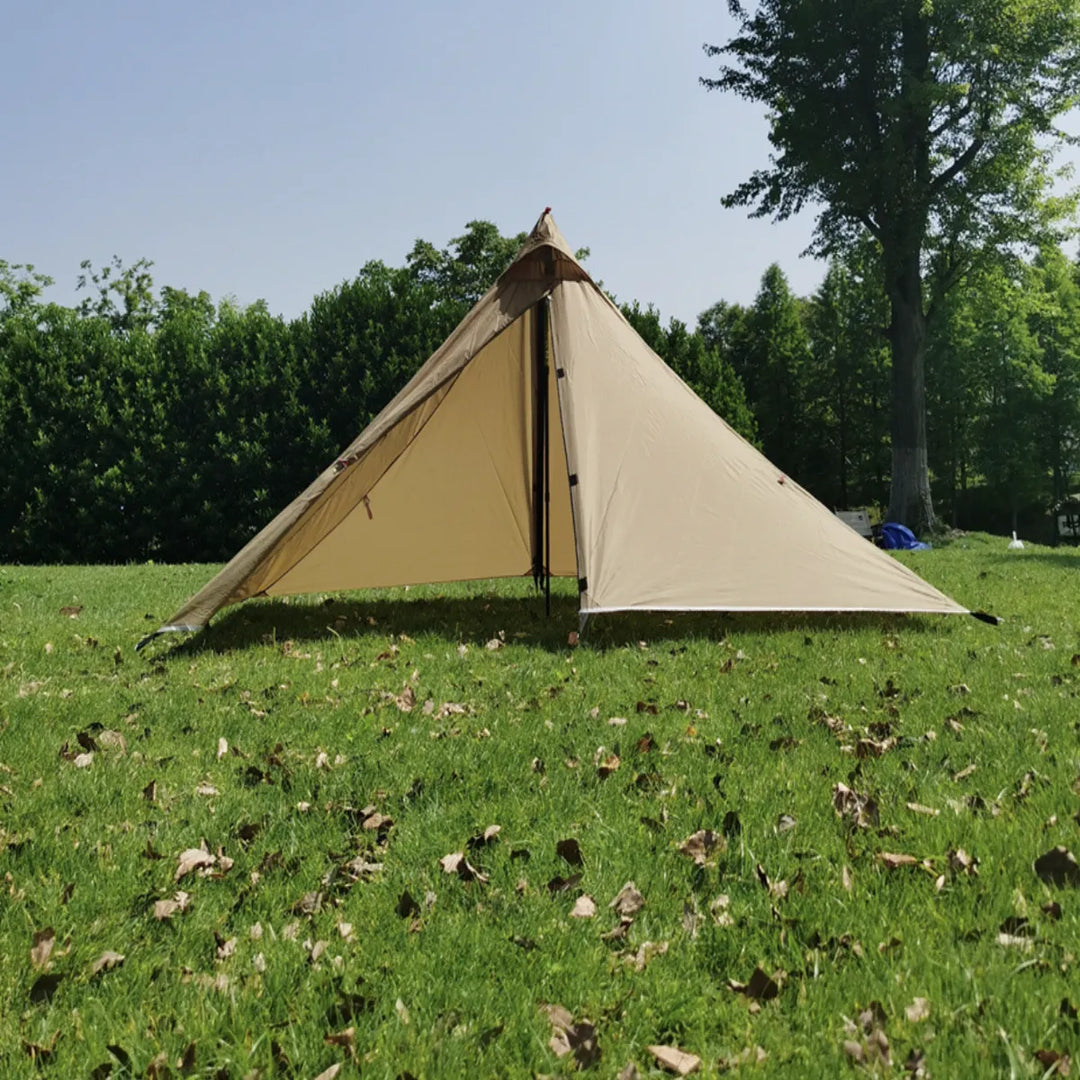 Pyramid tent interior view, showing spacious sleeping area for 1-2 campers.