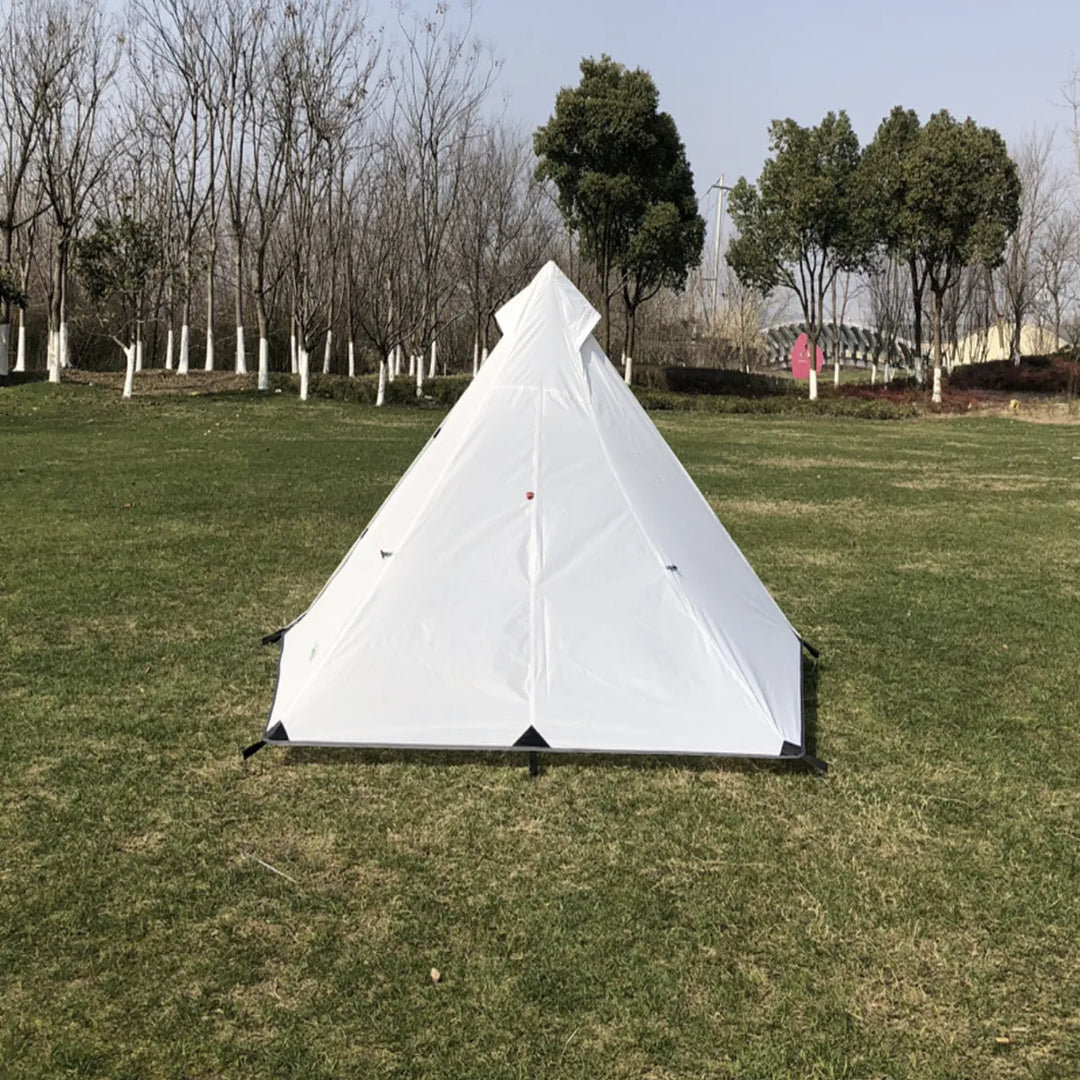 Waterproof ultralight pyramid tent, pitched on a mountain, ready for outdoor use.