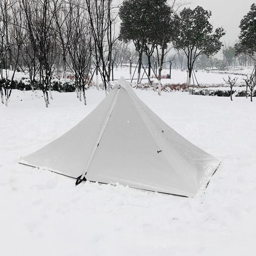 Durable 1-2 person camping shelter, front view, highlighting its stable pyramid design.