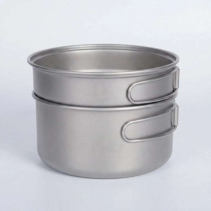 Folding handle titanium cookware set for backpacking. Compact, portable, & ultralight camping gear.