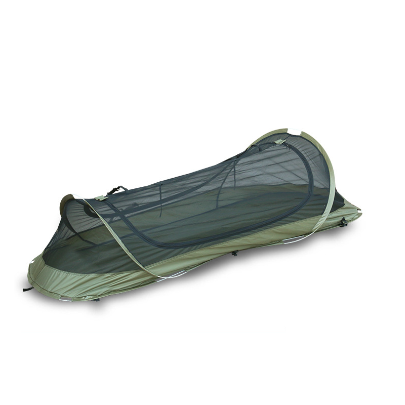 Solo camping tent pitched by a lake, demonstrating its versatility as outdoor gear for adventurers.