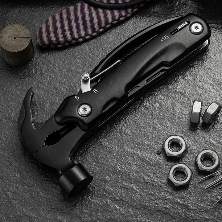 Close-up of portable 13-in-1 hammer multitool, essential survival camping tool