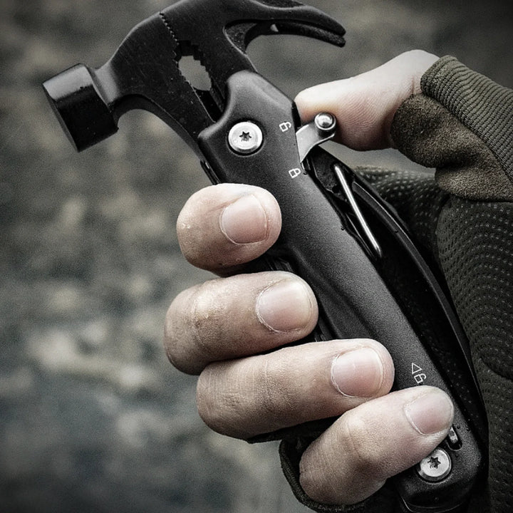 Versatile camping multitool with integrated hammer, ideal for outdoor enthusiasts