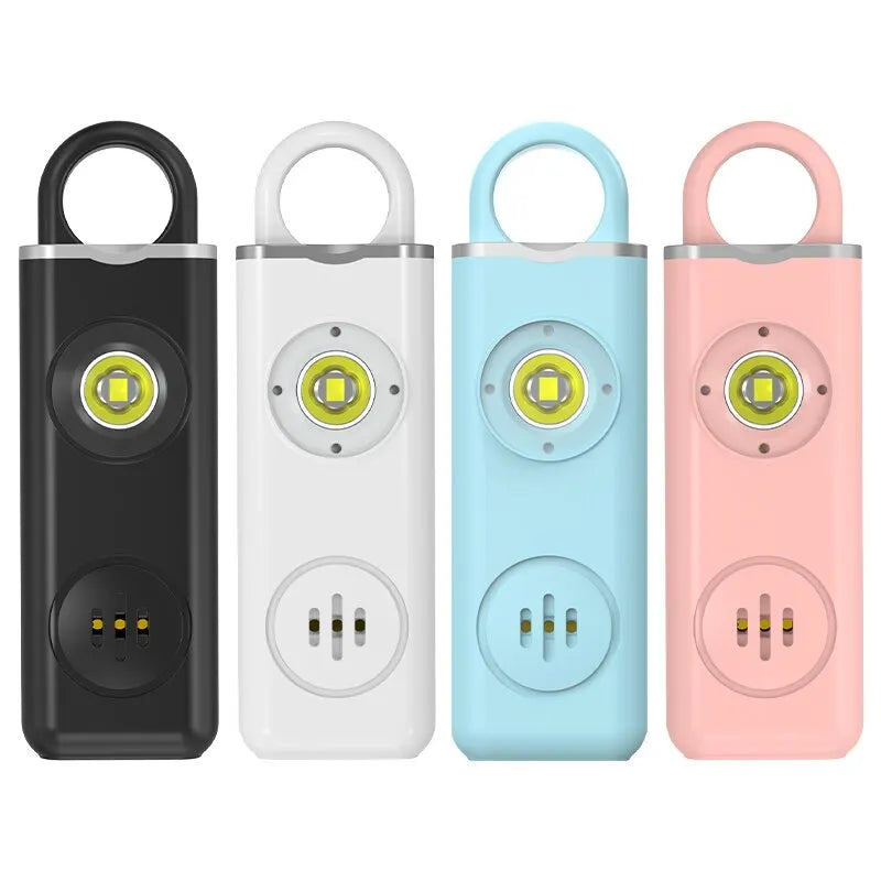 Unisex 130dB rechargeable personal safety alarm keychain with LED light, ideal for self-defense and emergency use.
