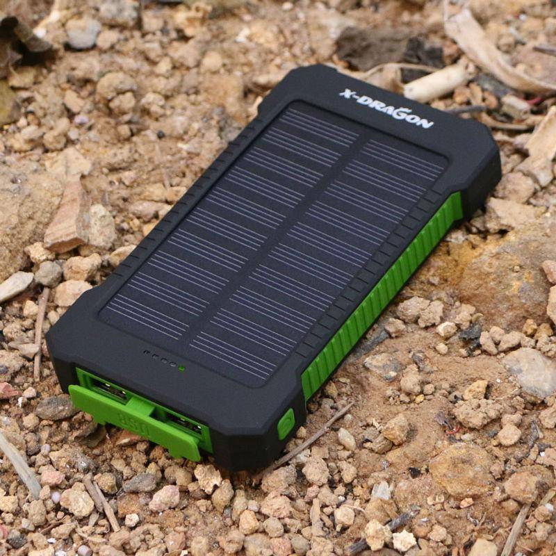 Unisex 20000mAh solar power bank charger with dual USB for outdoor gear and camping.