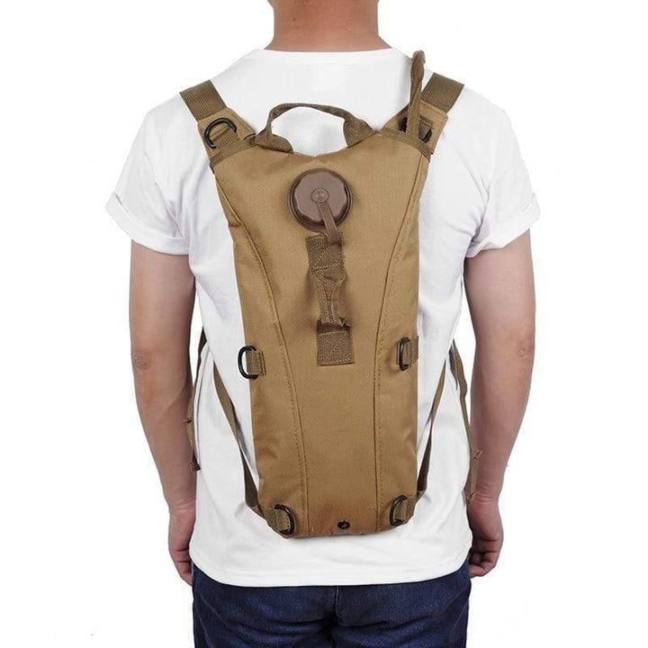 Side view of military style hydration pack, showing molle webbing for attachments