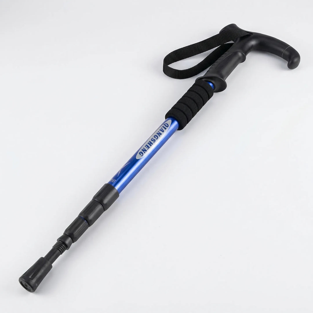 Close-up of a compact 4-section folding trekking pole, highlighting its adjustable, lightweight design.