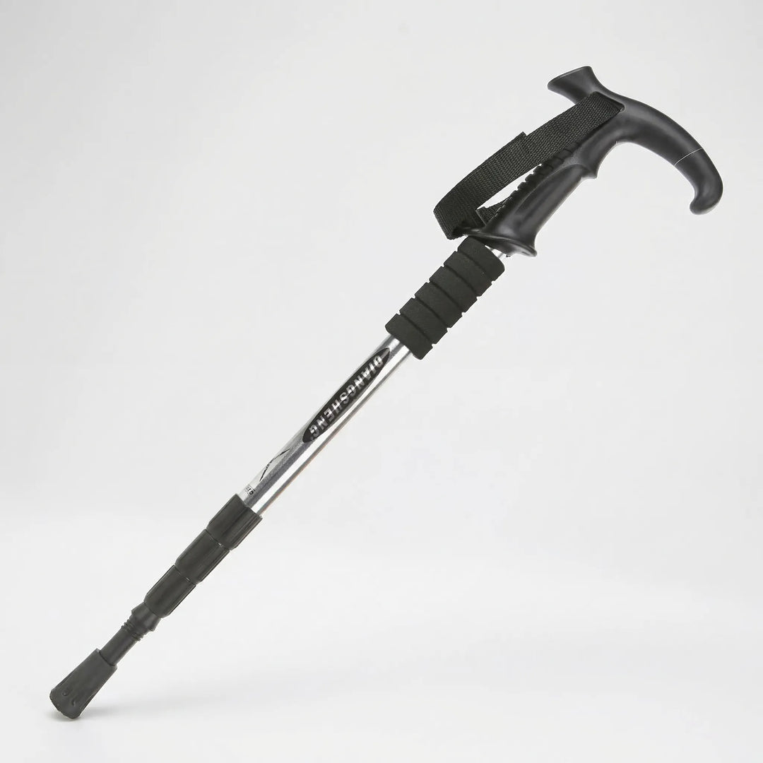 Folded 4-section trekking pole, compact and lightweight, perfect for travel, camping, and hiking adventures.