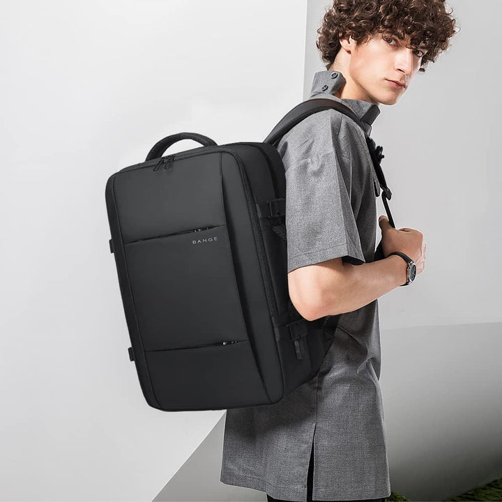 Durable 45L travel backpack for men & women, features anti-theft pocket & laptop sleeve.