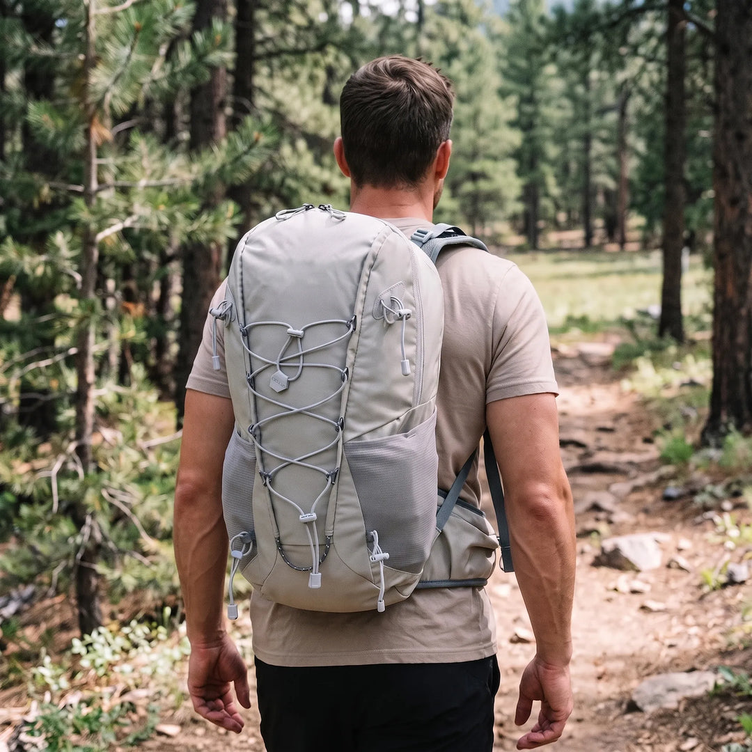 Unisex 6.6 gallon lightweight hiking daypack, perfect for outdoor adventures & travel.