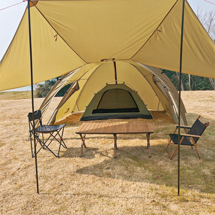 Overview of a 6-person unisex tunnel tent setup with a visible awning, ready for outdoor shelter.