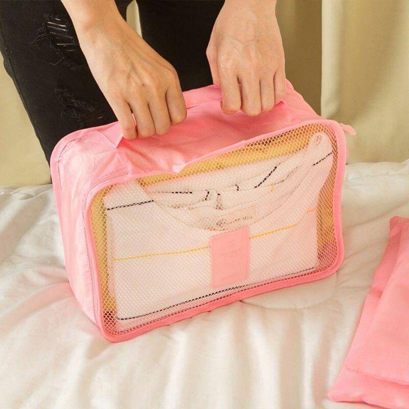 Get organized: Two 6-piece luggage packing organizer sets. Space-saving travel accessories.