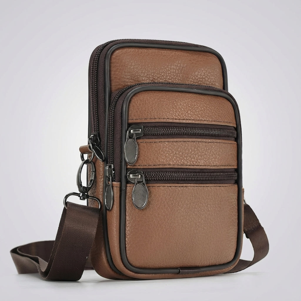Stylish black leather crossbody shoulder bag with adjustable strap, ideal for travel & daily use.