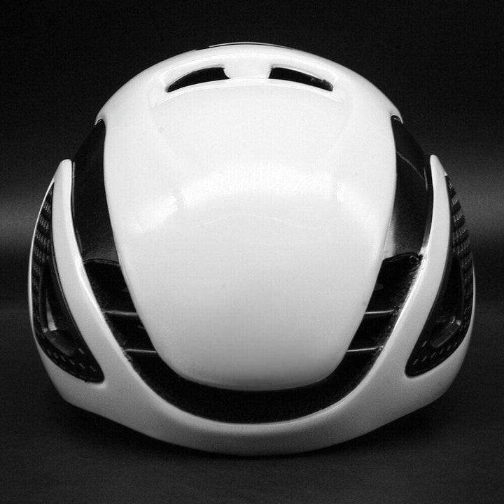 Close-up of a white aerodynamic cycling helmet with integrated molding, essential protective gear for cyclists