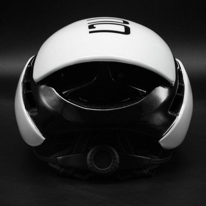 Rear view of a blue aerodynamic cycling helmet, emphasizing ventilation for comfortable bicycle gear