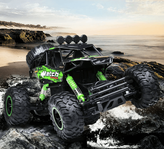 Close-up of a Unisex RC Monster Truck's big, rugged tires and powerful suspension system.