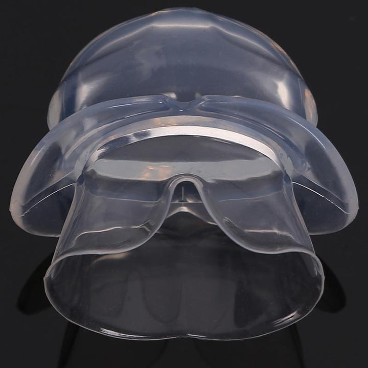 Unisex anti-snore tongue stabilizer. Oral device for quiet sleep and snore relief. Aids breathing.