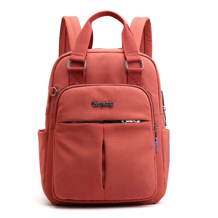School-ready anti-theft backpack, water-resistant with USB charging, multi-compartment for books & tech.