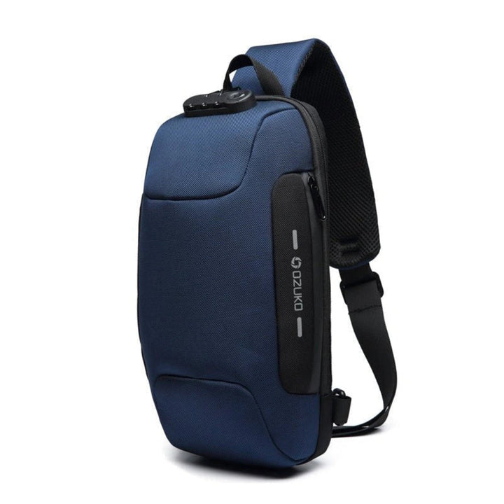 Navy unisex anti-theft travel sling bag. Secure crossbody commuter bag with USB charging for valuables.