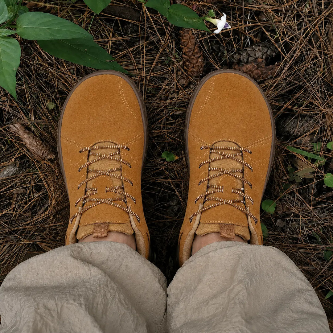 Orthopedic barefoot hiking shoes, minimalist design with a flexible sole.