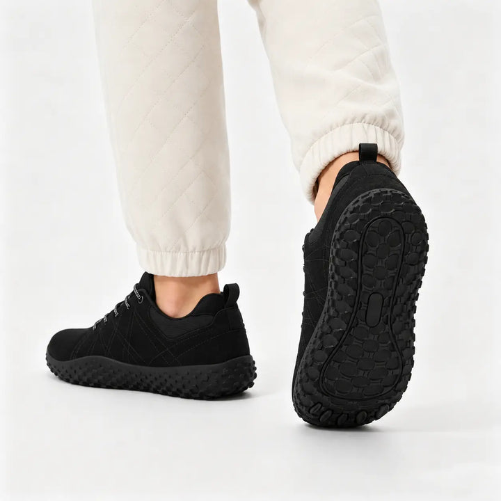 Orthopedic hiking trainers, wide toe box design supporting natural foot spread.