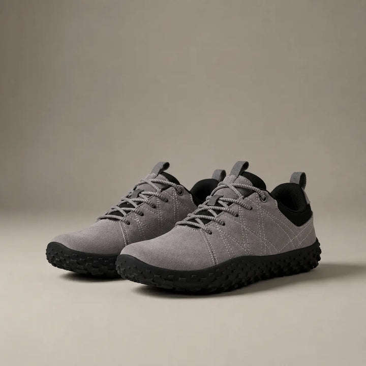 Durable barefoot hiking trainers, wide toe box for stability on various terrains.