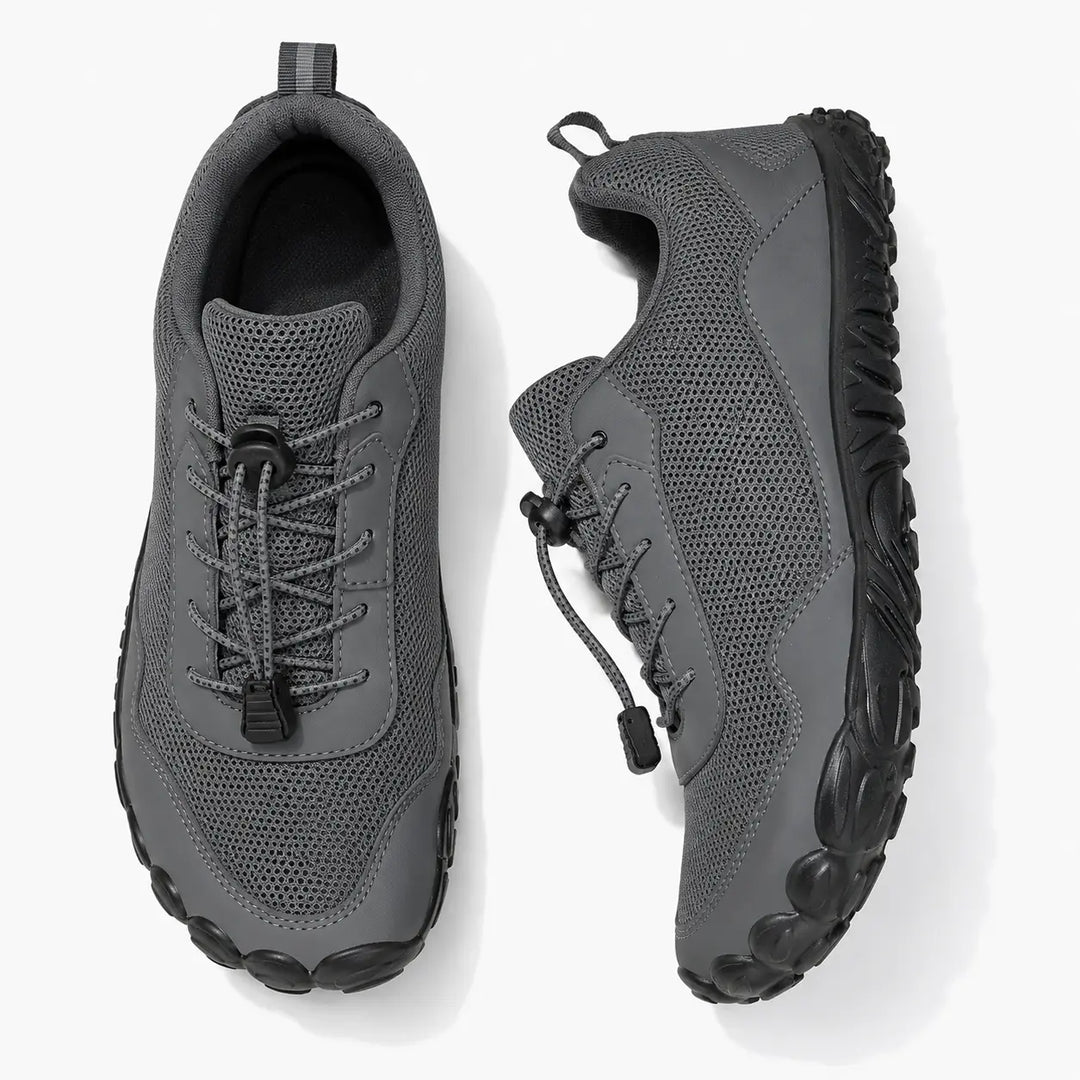 Durable unisex outdoor trainers for active hiking & trail walking, featuring a wide toe box & non-slip grip.