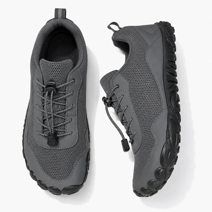 Durable unisex outdoor trainers for active hiking & trail walking, featuring a wide toe box & non-slip grip.