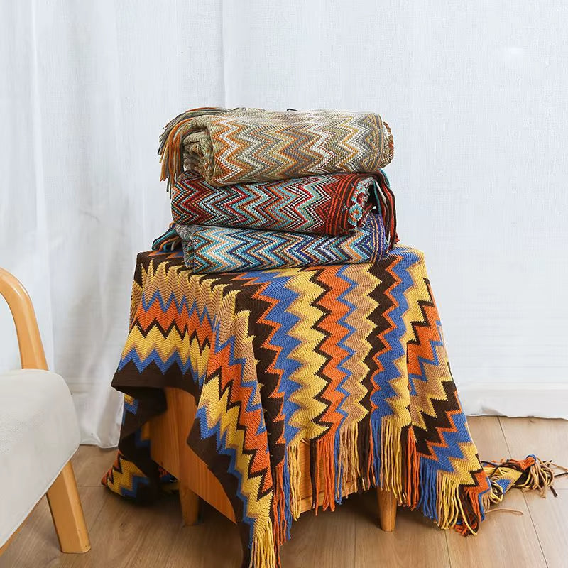 Chic boho striped throw blanket, a perfect tassel accent for modern home decor.