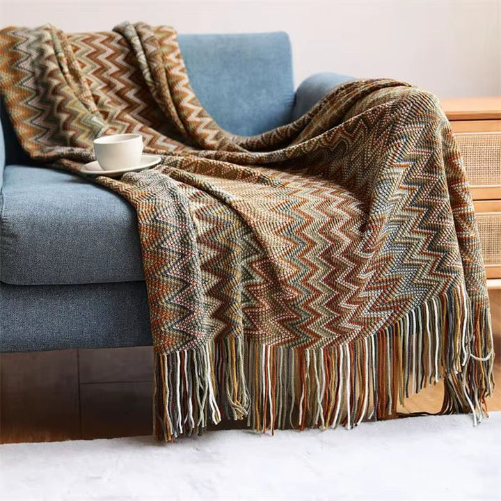 Versatile unisex boho striped throw blanket with tassels, great for any room's decor.