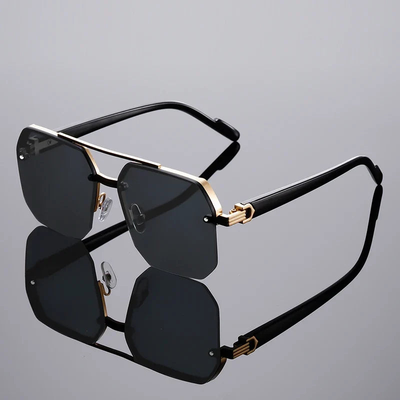 Bold geometric rimless sunglasses for men & women, featuring gradient lenses and UV protection.