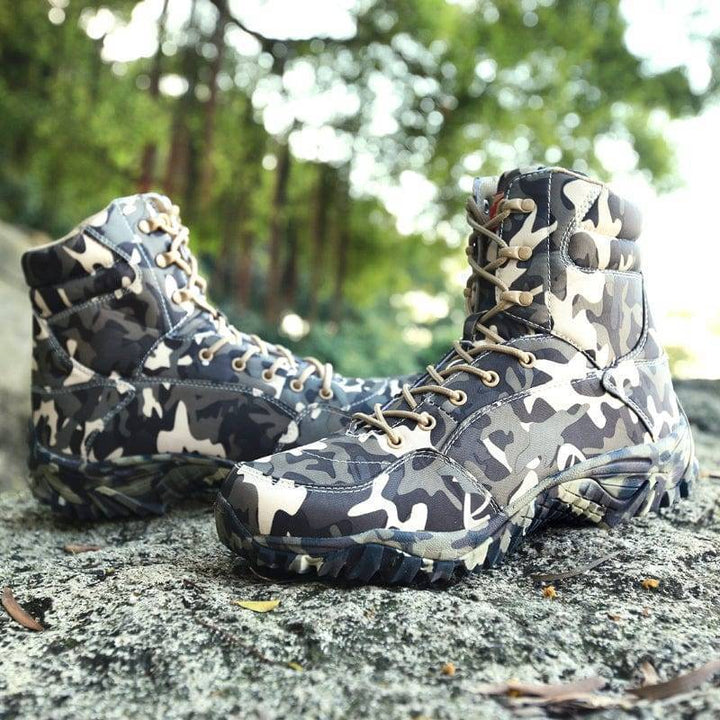 Pair of unisex camouflage trekking boots made from durable canvas, ideal outdoor footwear for hiking
