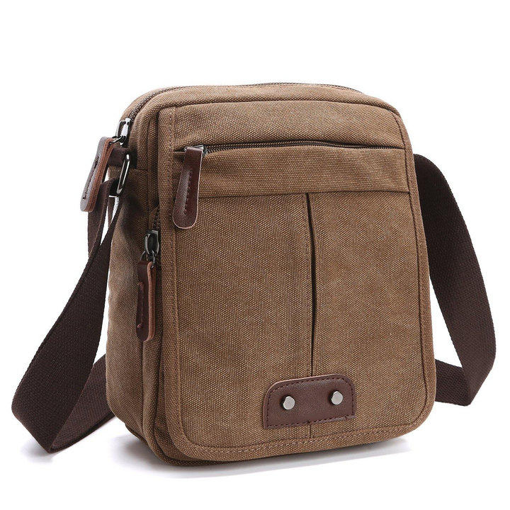 Durable multi-pocket canvas messenger bag. Casual unisex shoulder bag, perfect for daily essentials & travel.